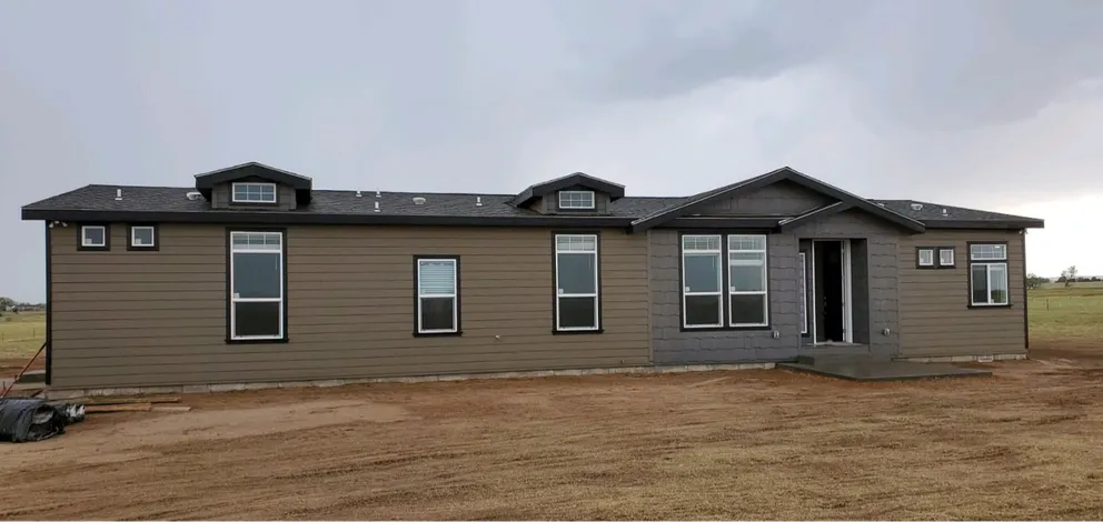 The ENCHANTMENT 3070A Exterior. This Manufactured Mobile Home features 3 bedrooms and 2 baths.