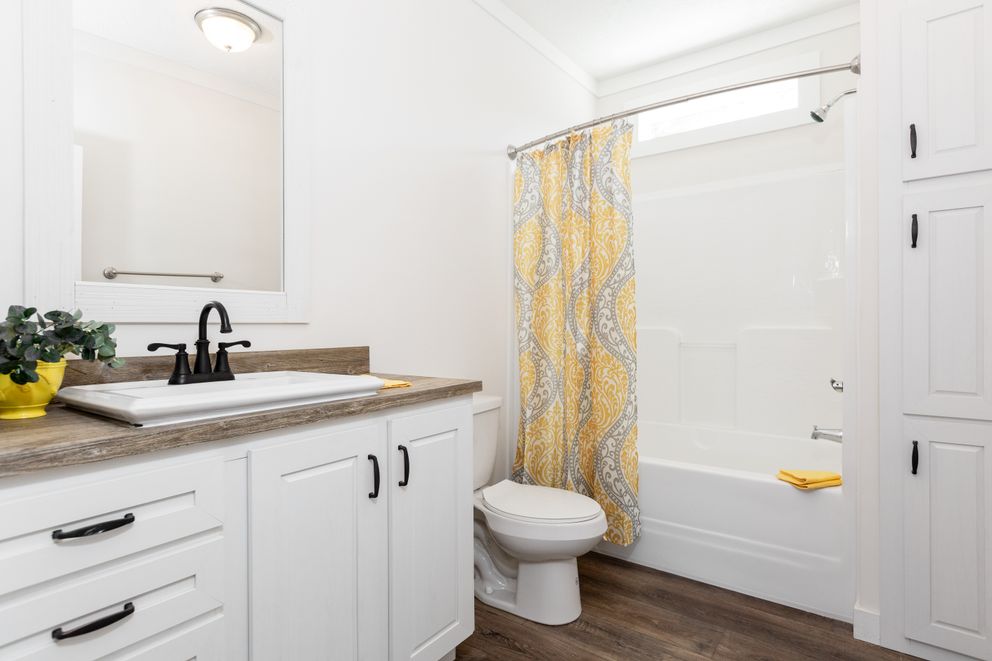 The 1442 CAROLINA SOUTHERN COMFORT Exterior. This Manufactured Mobile Home features 3 bedrooms and 2 baths.