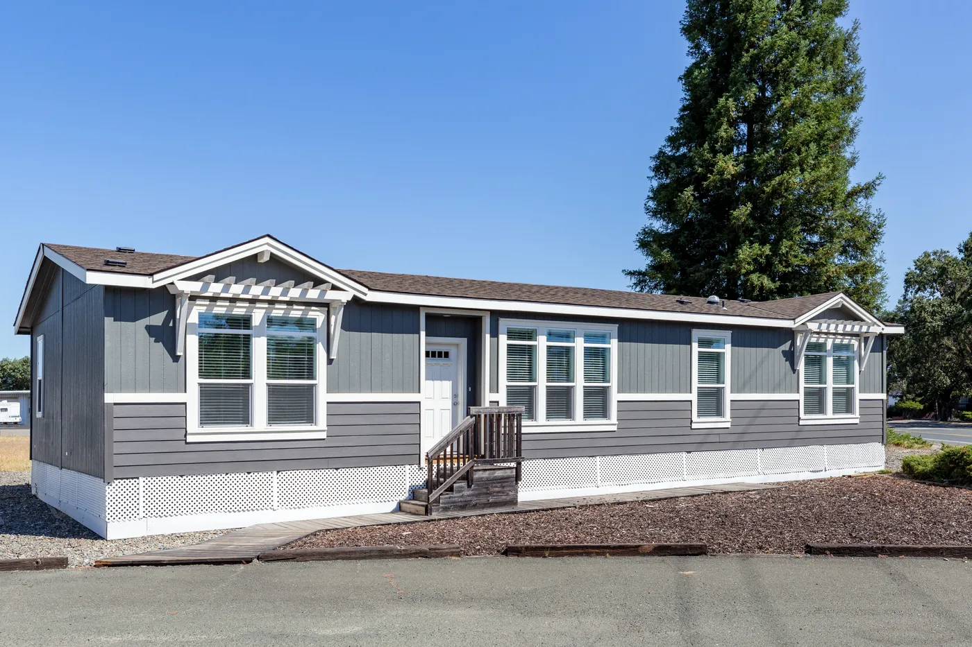 The CORONADO 2458C Exterior. This Manufactured Mobile Home features 3 bedrooms and 2 baths.