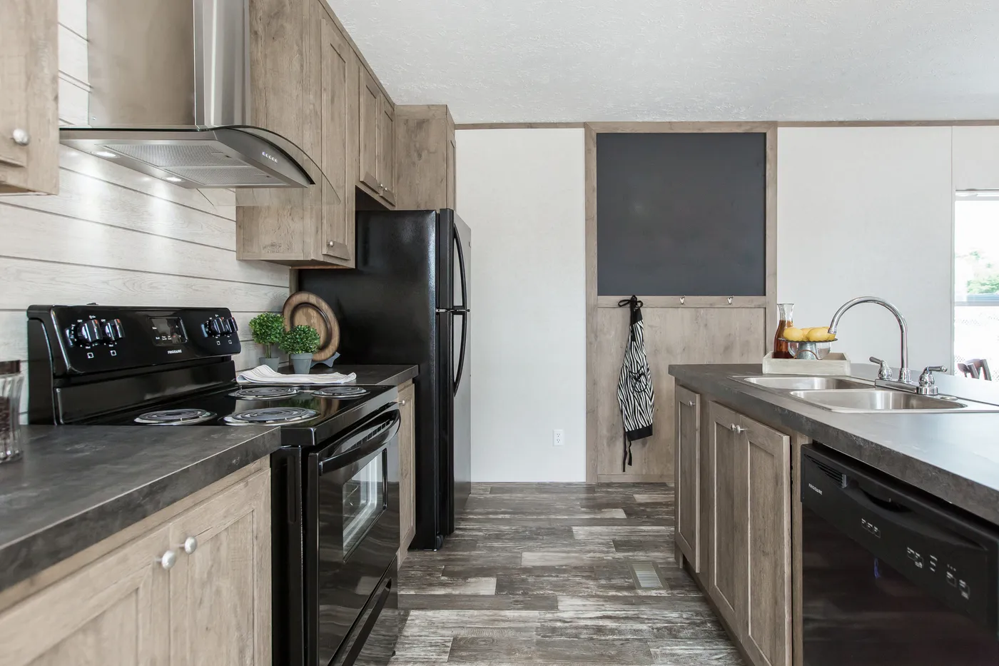 The THE BREEZE Exterior. This Manufactured Mobile Home features 3 bedrooms and 2 baths.