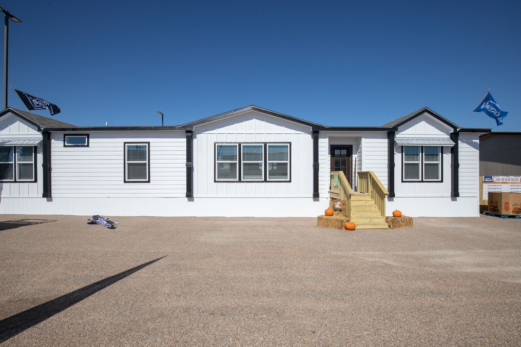 The THE BRAZOS Exterior. This Manufactured Mobile Home features 3 bedrooms and 2.5 baths.