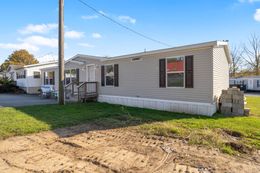 The FULTON 6028-2557D Exterior. This Manufactured Mobile Home features 3 bedrooms and 2 baths.