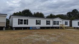 The EVEREST with white Southern Ranch Exterior. This Manufactured Mobile Home features 4 bedrooms and 2 baths.
