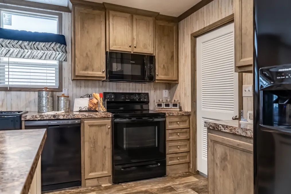 The NUMBER ONE Exterior. This Manufactured Mobile Home features 3 bedrooms and 2 baths.