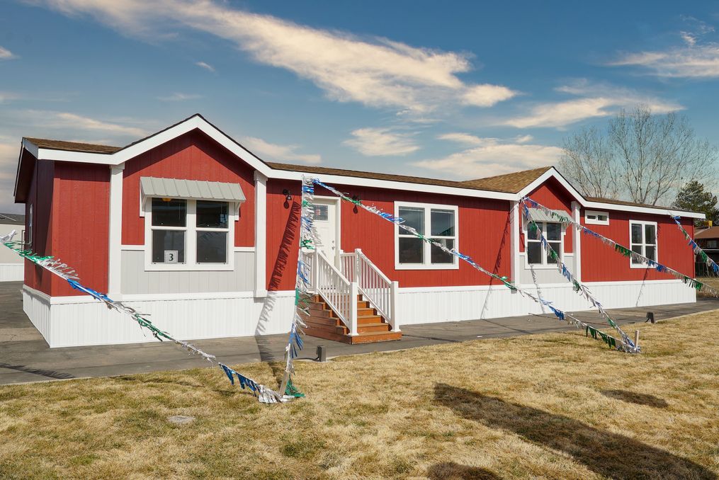 The CERISE Exterior. This Manufactured Mobile Home features 4 bedrooms and 2 baths.