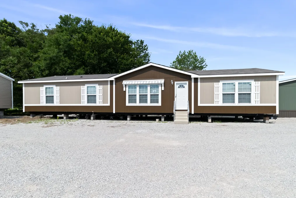 The THE MAVERICK Exterior. This Manufactured Mobile Home features 4 bedrooms and 2 baths.