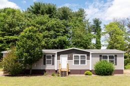 The LEWIS Exterior. This Manufactured Mobile Home features 3 bedrooms and 2 baths.