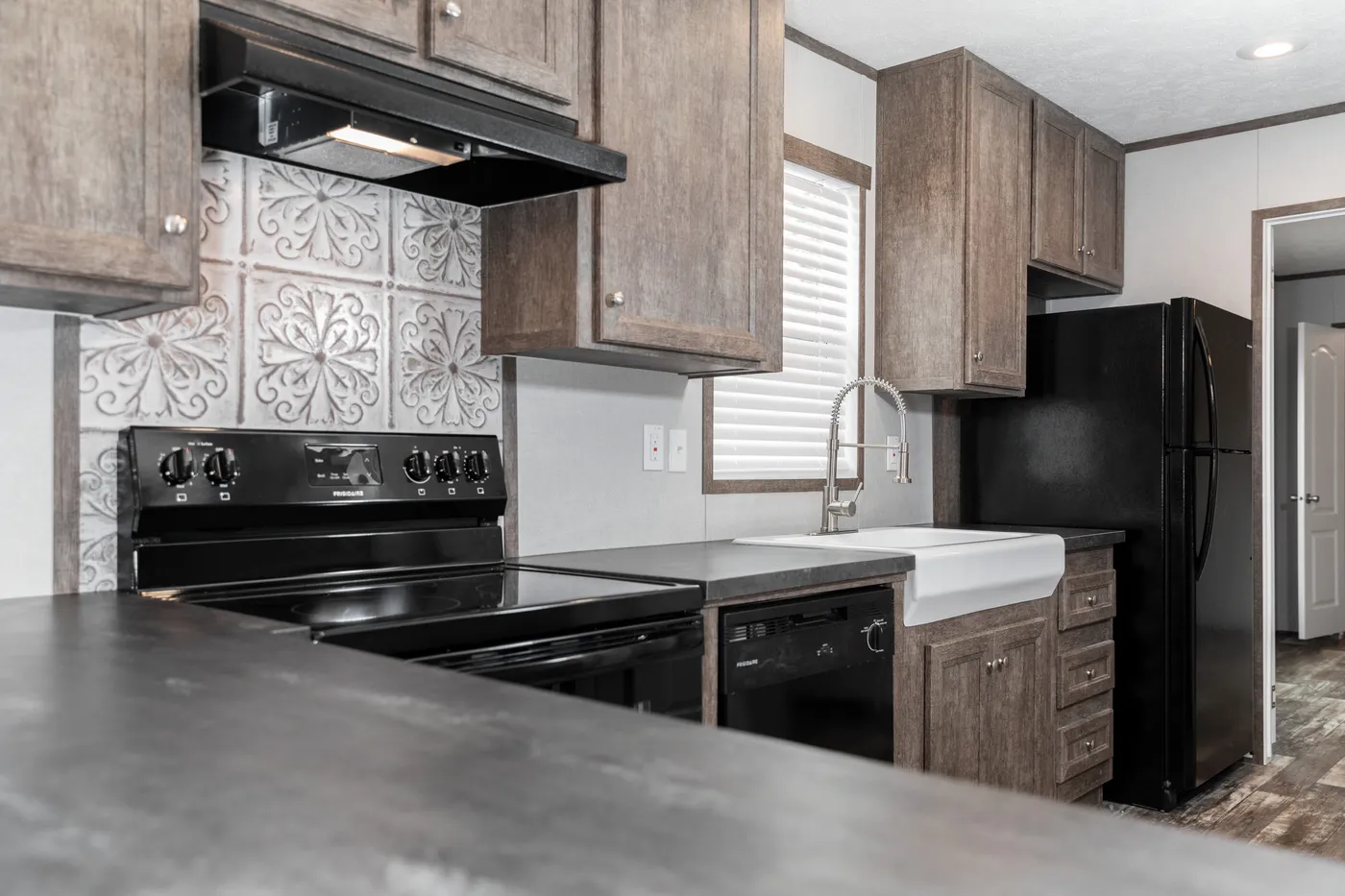 The THE ANNIVERSARY 68 Exterior. This Manufactured Mobile Home features 2 bedrooms and 2 baths.