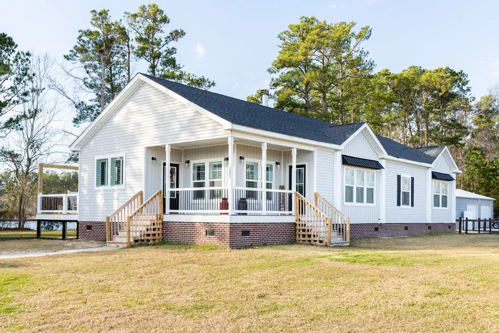 The 1434 CAROLINA "SOUTHERN BELLE" Exterior. This Manufactured Mobile Home features 3 bedrooms and 2 baths.