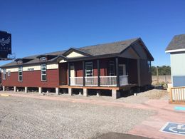 The SUM3068A Exterior. This Manufactured Mobile Home features 3 bedrooms and 2 baths.