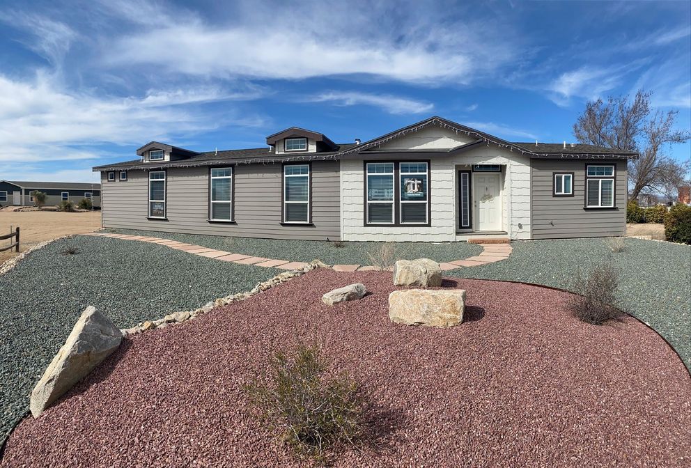 The ENCHANTMENT 3070A Exterior. This Manufactured Mobile Home features 3 bedrooms and 2 baths.