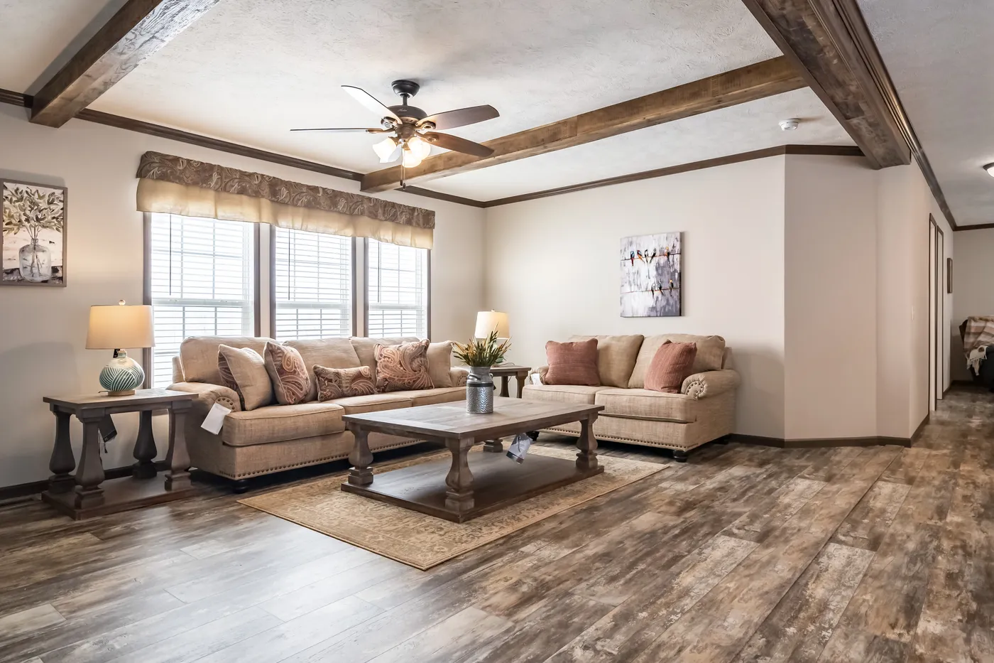 The THE STARK Living Room. This Manufactured Mobile Home features 3 bedrooms and 2 baths.