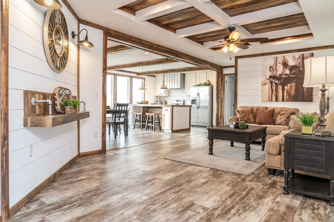 The THE AVALYN Living Room. This Manufactured Mobile Home features 3 bedrooms and 2 baths.