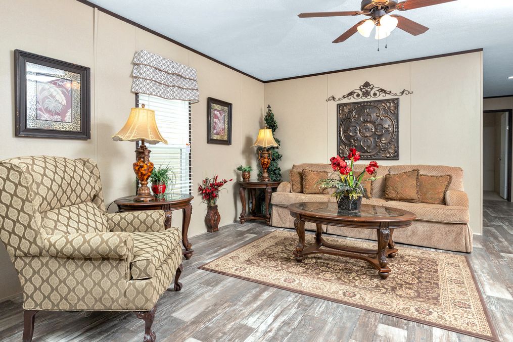 The THE SHERMAN Living Room. This Manufactured Mobile Home features 3 bedrooms and 2 baths.