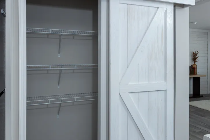 The THE FREEDOM BREEZE Kitchen. This Manufactured Mobile Home features 3 bedrooms and 2 baths.