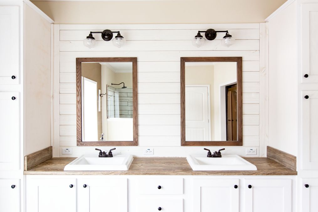 The SOUTHERN CHARM Master Bathroom. This Manufactured Mobile Home features 3 bedrooms and 2 baths.