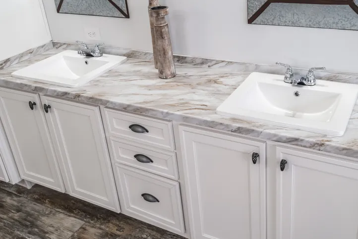 The THE LEAHY Primary Bathroom. This Manufactured Mobile Home features 4 bedrooms and 2 baths.