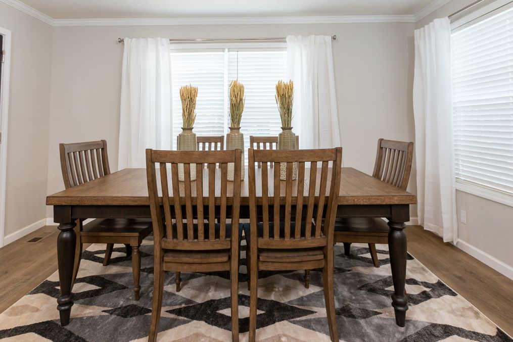 The KEENELAND Dining Area. This Manufactured Mobile Home features 3 bedrooms and 2 baths.