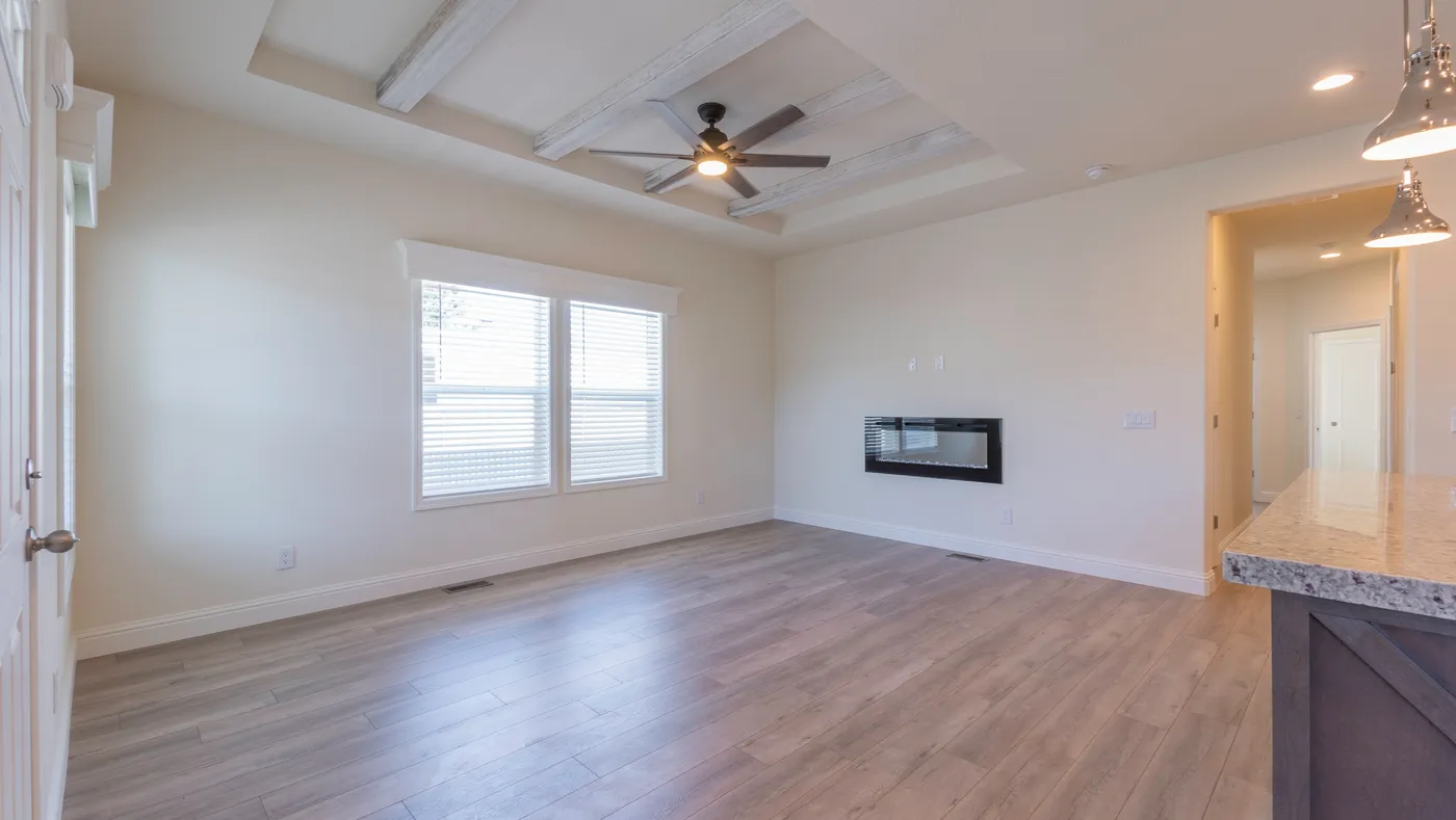 The CORONADO 2456B Living Room. This Manufactured Mobile Home features 3 bedrooms and 2 baths.