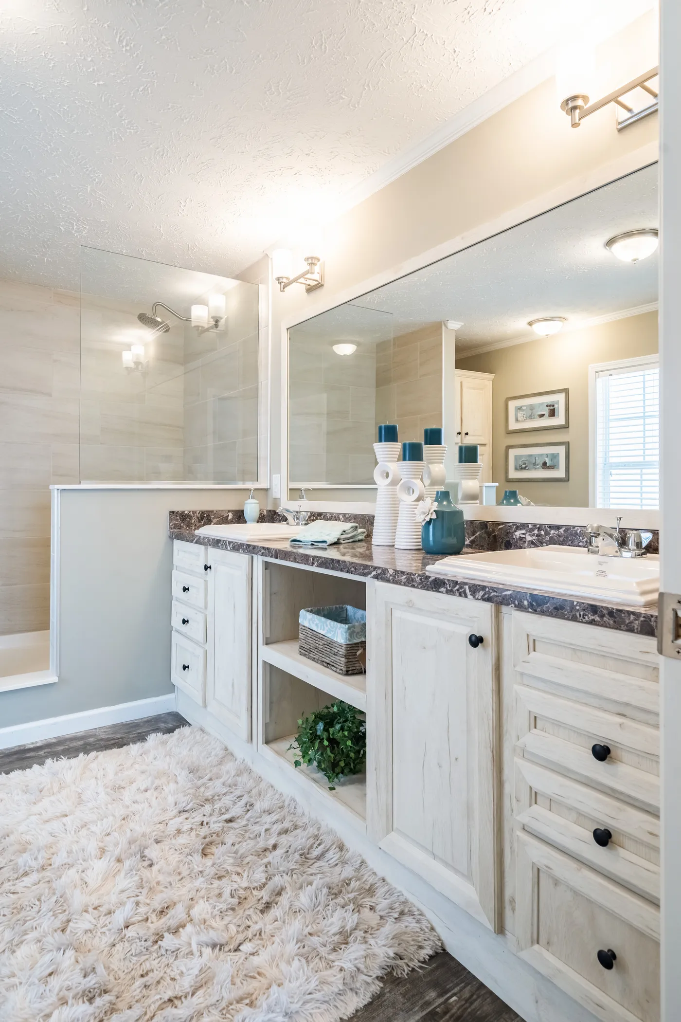 The 4608 ROCKETEER 5628 Primary Bathroom. This Manufactured Mobile Home features 3 bedrooms and 2 baths.