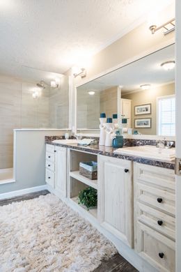 The 4608 ROCKETEER 5628 Primary Bathroom. This Manufactured Mobile Home features 3 bedrooms and 2 baths.