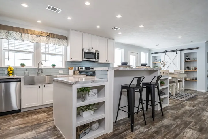 The THE LEAHY Kitchen. This Manufactured Mobile Home features 4 bedrooms and 2 baths.