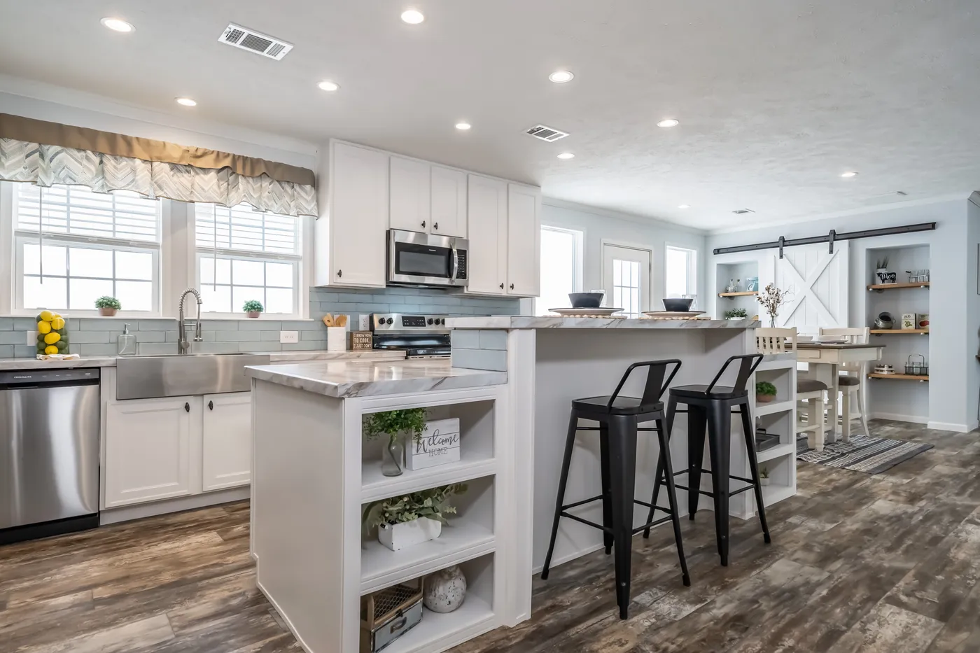 The THE LEAHY Kitchen. This Manufactured Mobile Home features 4 bedrooms and 2 baths.