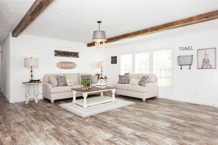 The THE LULABELLE Living Room. This Manufactured Mobile Home features 4 bedrooms and 3 baths.