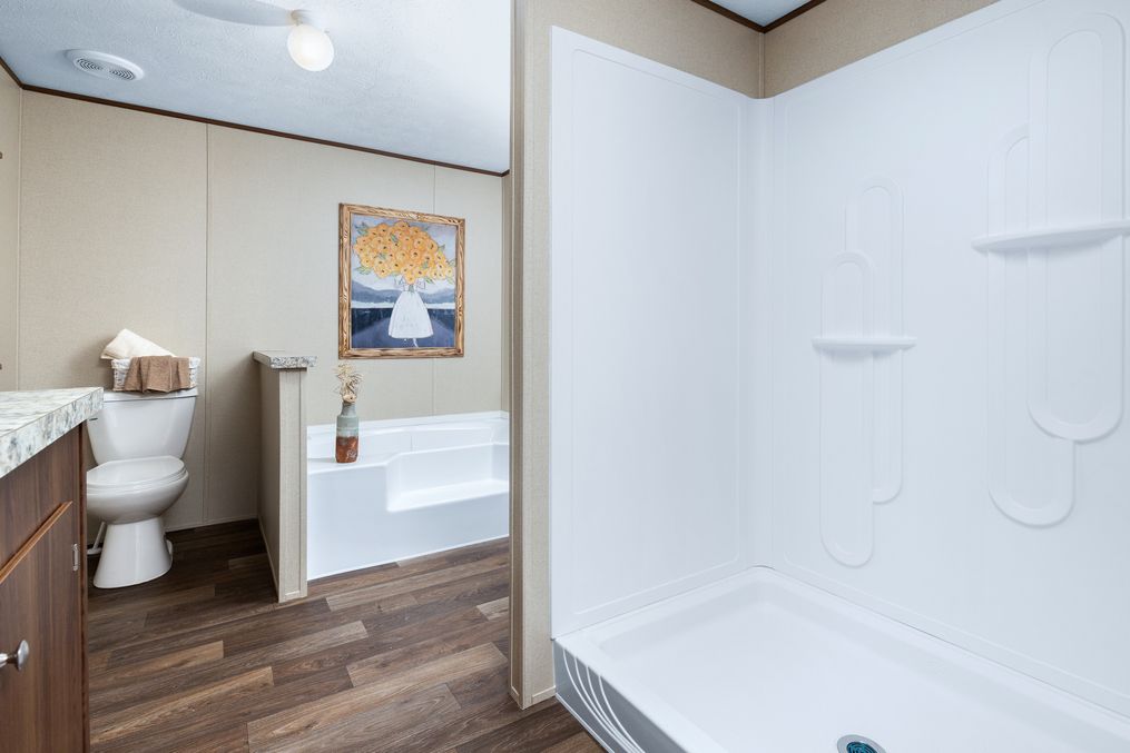 The VICTORY PLUS Primary Bathroom. This Manufactured Mobile Home features 3 bedrooms and 2 baths.