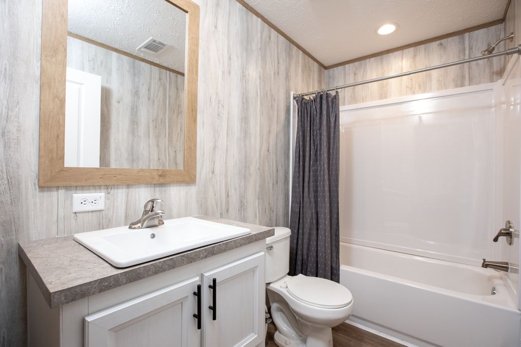 The RIO Guest Bathroom. This Manufactured Mobile Home features 3 bedrooms and 2 baths.