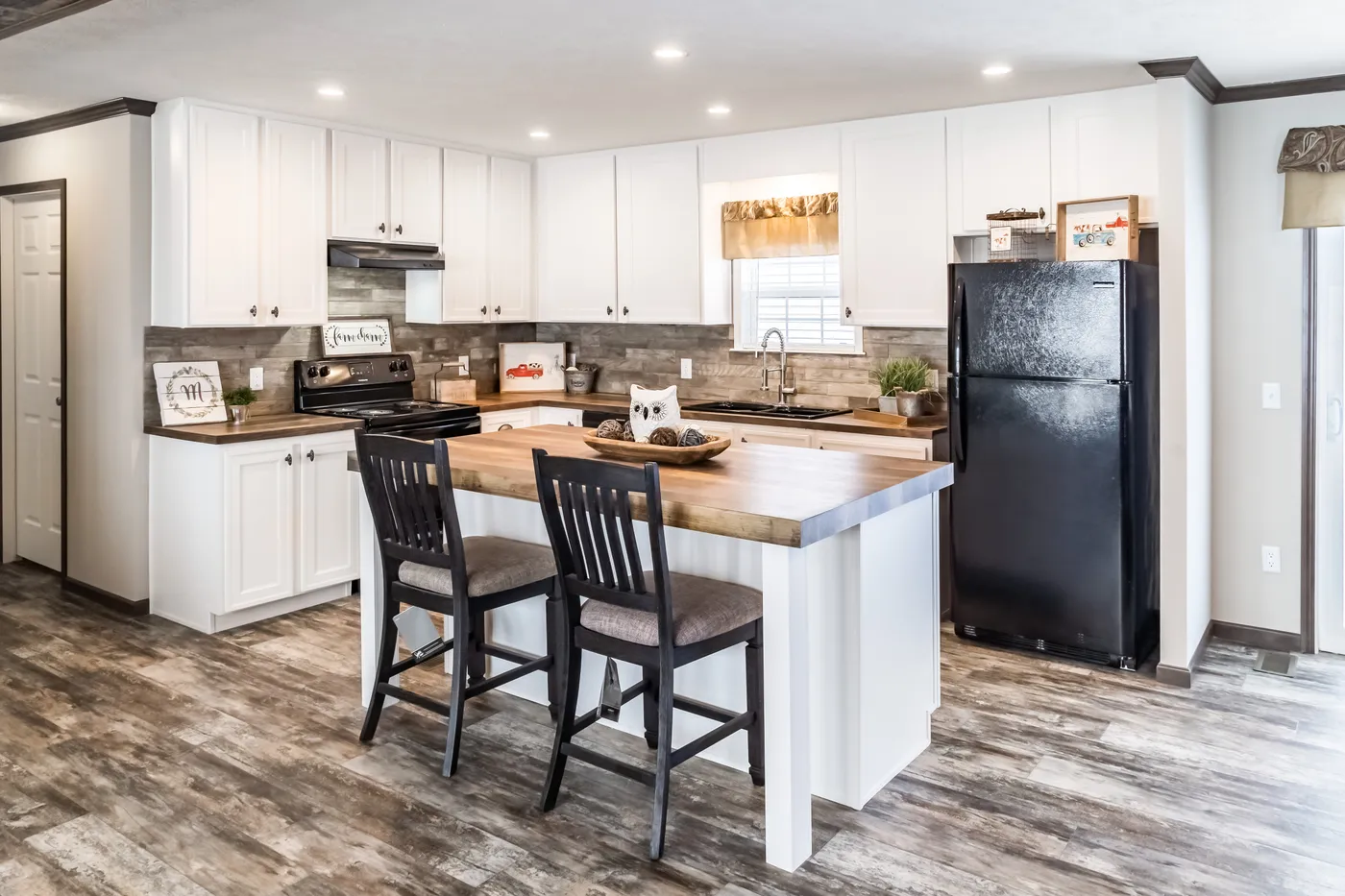 The THE STARK Kitchen. This Manufactured Mobile Home features 3 bedrooms and 2 baths.