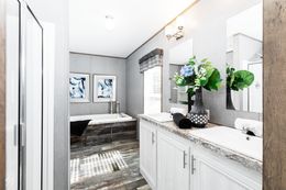 The THE MORRIS Primary Bathroom. This Manufactured Mobile Home features 3 bedrooms and 2 baths.