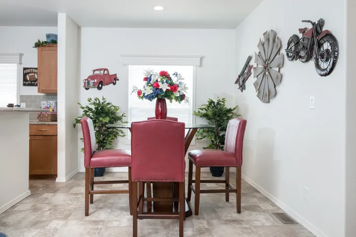 The K2760A Dining Area. This Manufactured Mobile Home features 3 bedrooms and 2 baths.
