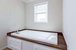 The REMINGTON Primary Bathroom. This Manufactured Mobile Home features 3 bedrooms and 2 baths.
