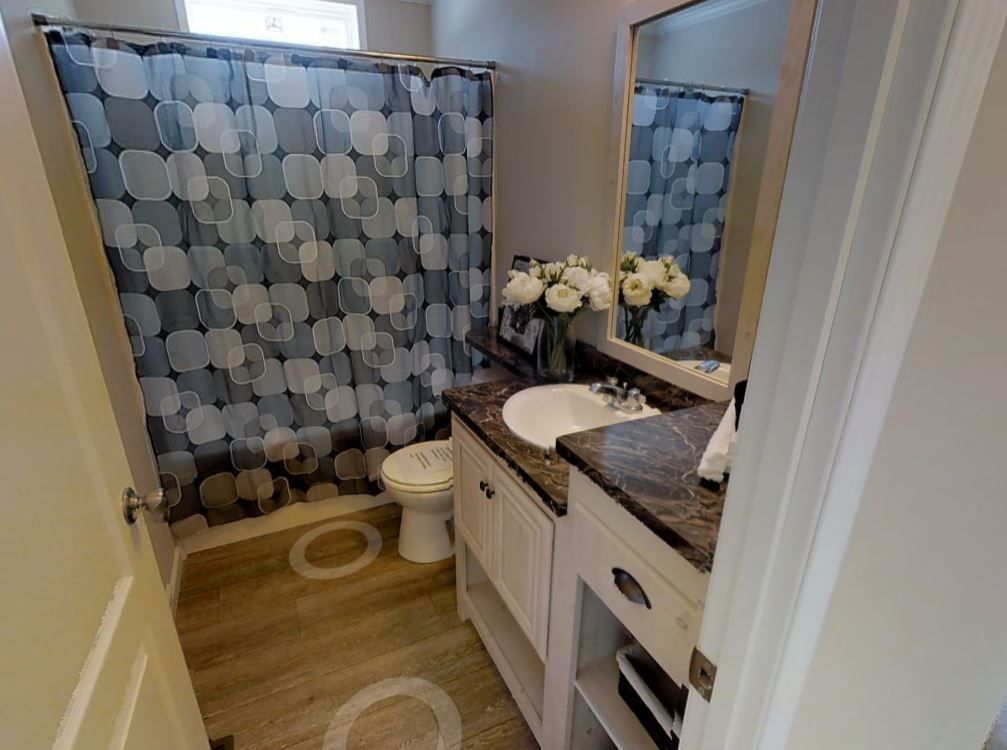 The FRASER 4828-49 Guest Bathroom. This Manufactured Mobile Home features 3 bedrooms and 2 baths.