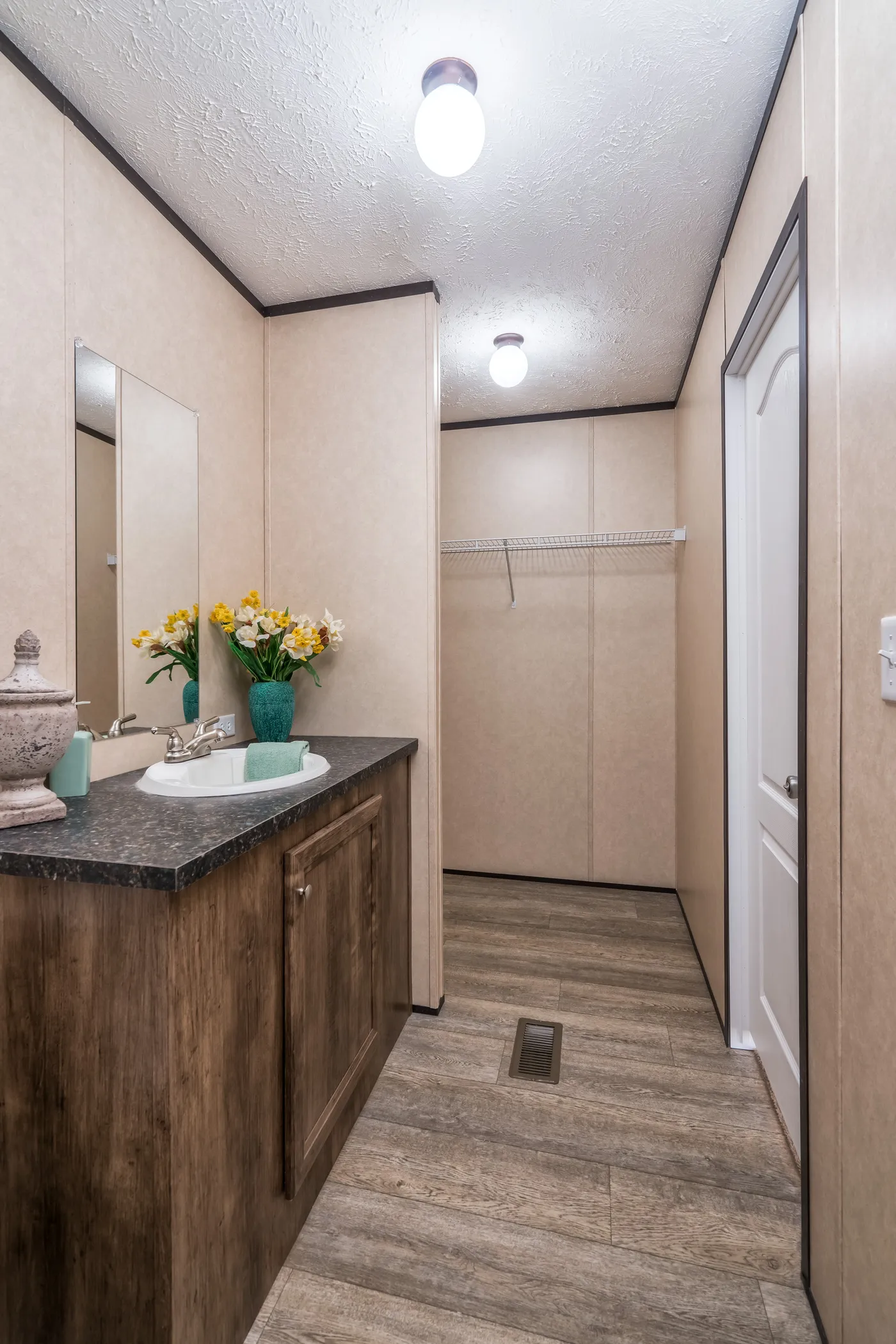 The THE BREEZE Primary Bathroom. This Manufactured Mobile Home features 3 bedrooms and 2 baths.
