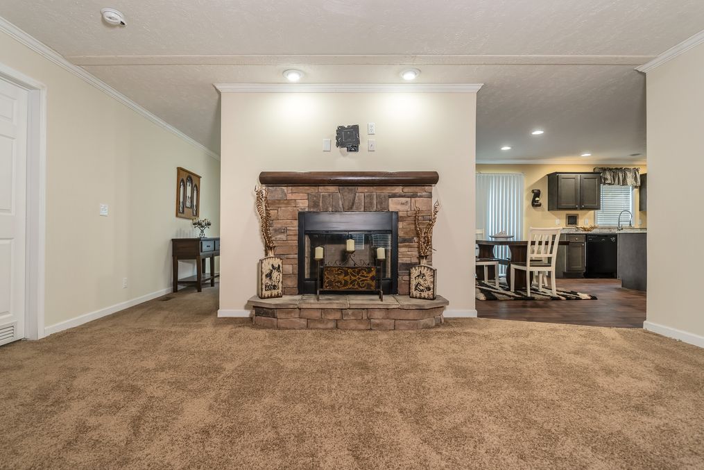 The WINCHESTER FLEX Living Room. This Manufactured Mobile Home features 4 bedrooms and 2 baths.