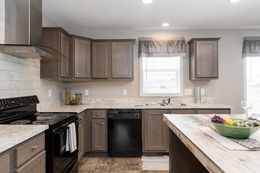 The LAKE DR 4428-MS006 SECT Floor Plan. This Manufactured Mobile Home features 3 bedrooms and 2 baths.