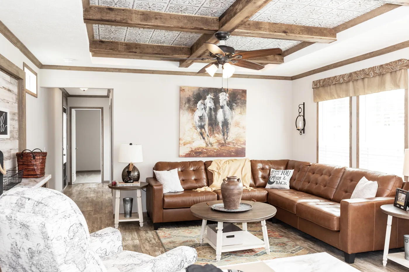 The THE MARION Living Room. This Manufactured Mobile Home features 3 bedrooms and 2 baths.