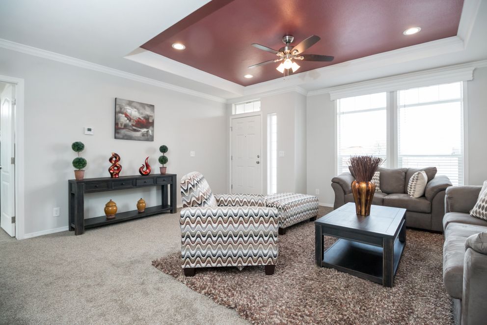 The ENCHANTMENT 3070A Family Room. This Manufactured Mobile Home features 3 bedrooms and 2 baths.