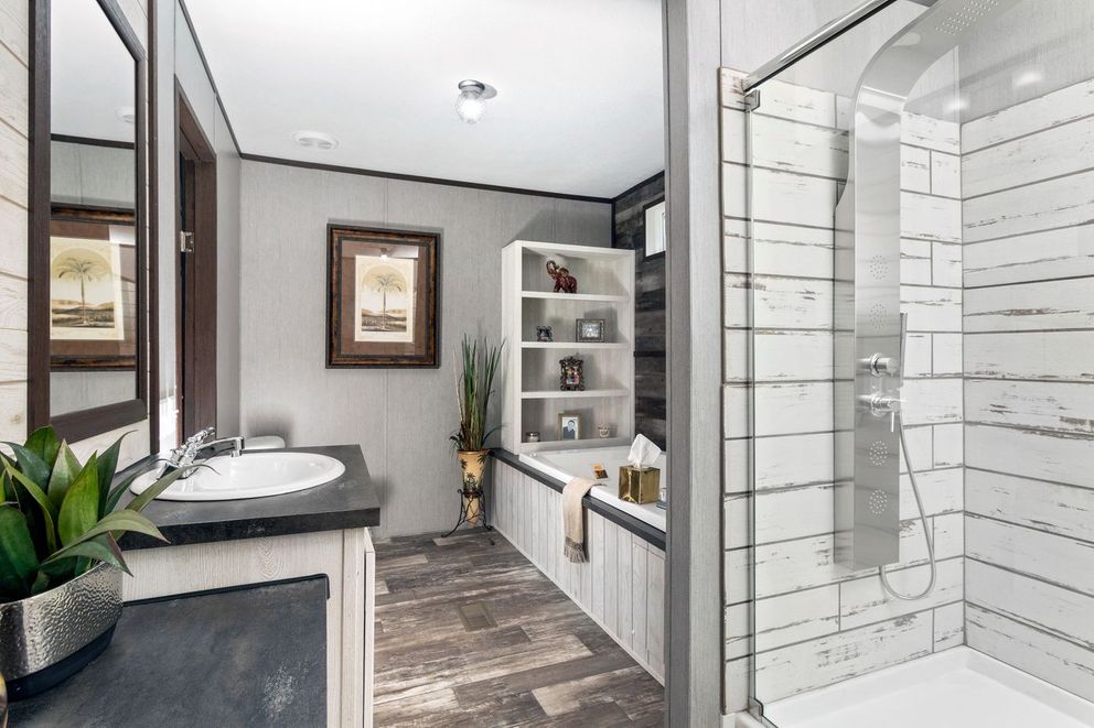 The THE SEASIDE Primary Bathroom. This Manufactured Mobile Home features 3 bedrooms and 2 baths.