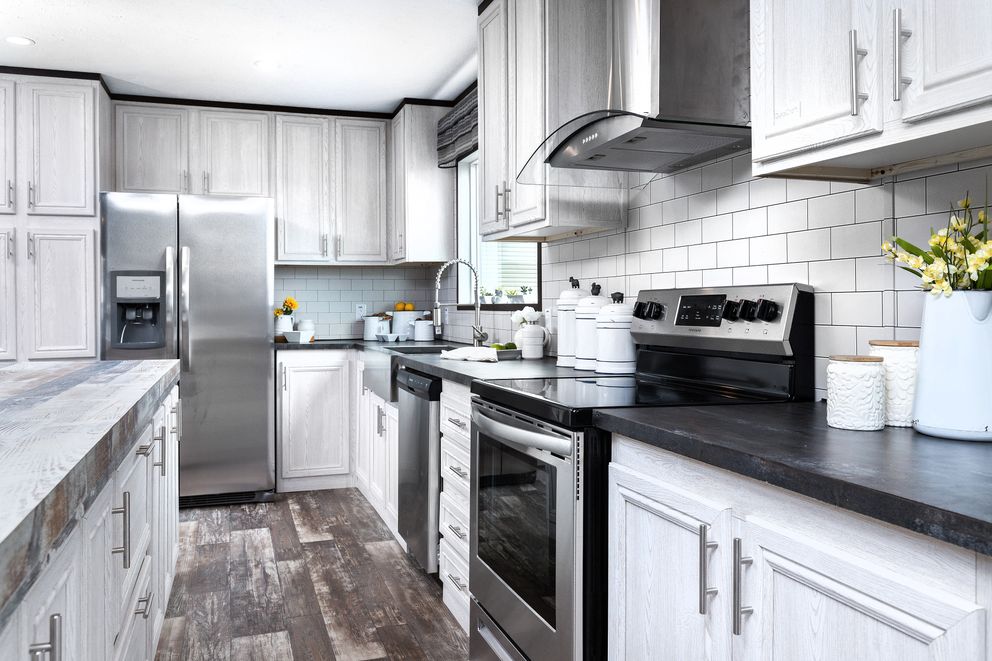 The SIG28663A Kitchen. This Manufactured Mobile Home features 3 bedrooms and 2 baths.