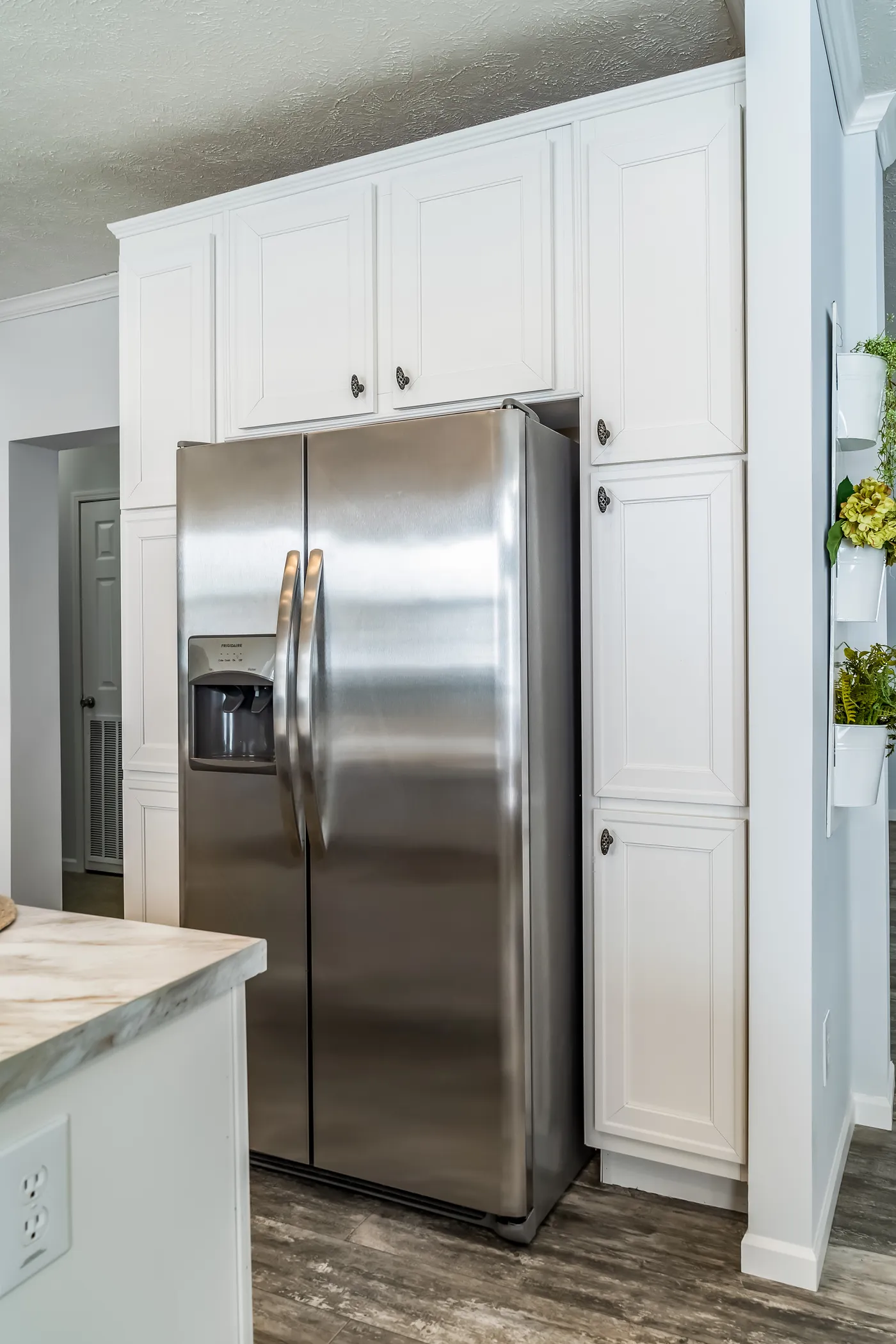 The THE INGRAM Kitchen. This Manufactured Mobile Home features 3 bedrooms and 2 baths.