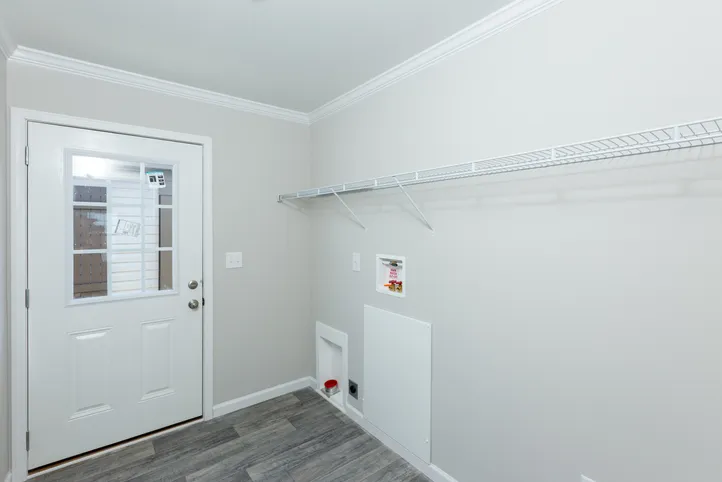 The THE FREEDOM BREEZE Utility Room. This Manufactured Mobile Home features 3 bedrooms and 2 baths.