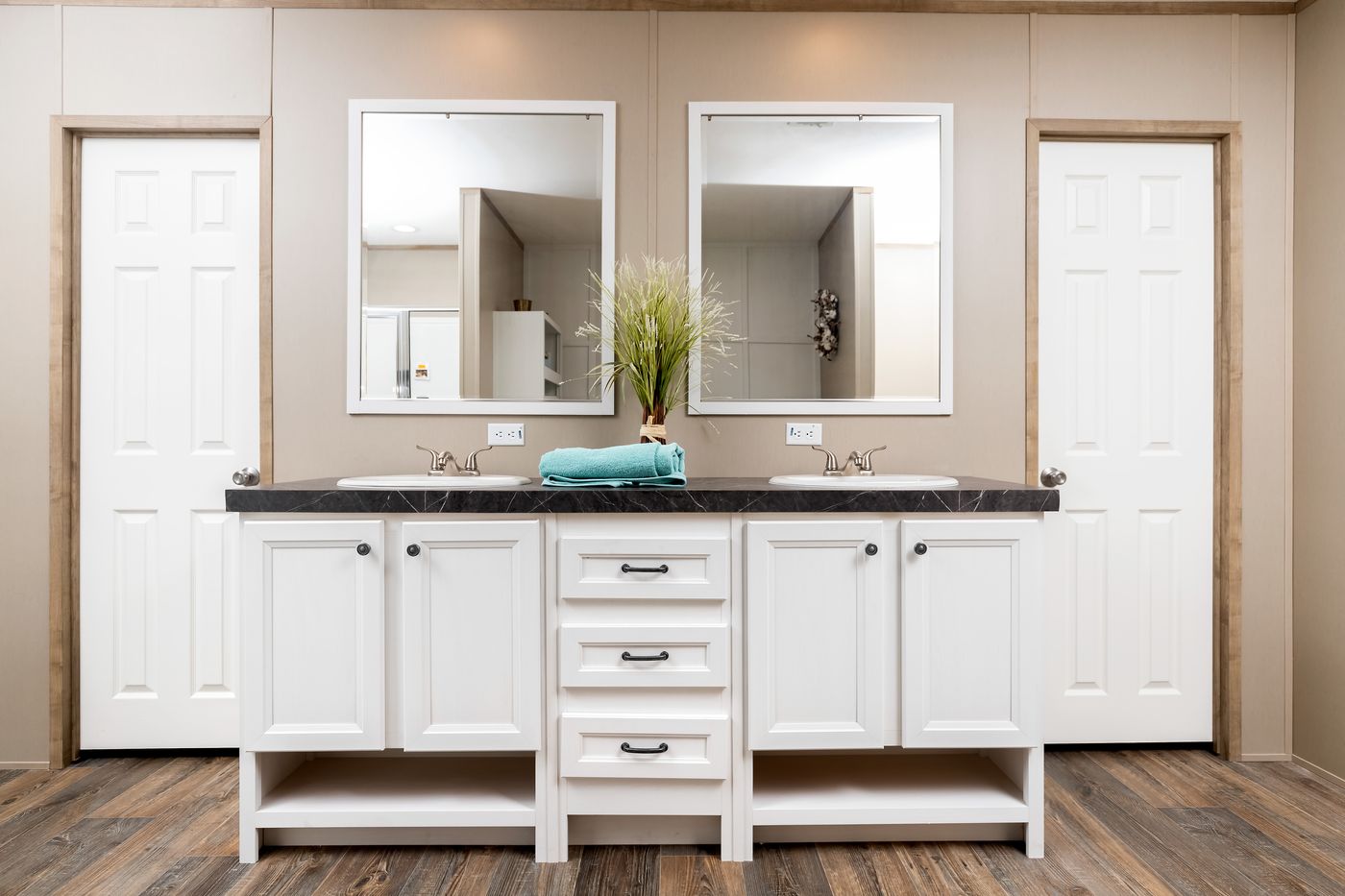 The FARMHOUSE FLEX Primary Bathroom. This Manufactured Mobile Home features 3 bedrooms and 2.5 baths.