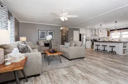 The THE CASCADE Living Room. This Manufactured Mobile Home features 4 bedrooms and 2 baths.