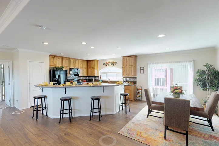The K3066A Dining Room. This Manufactured Mobile Home features 3 bedrooms and 2 baths.
