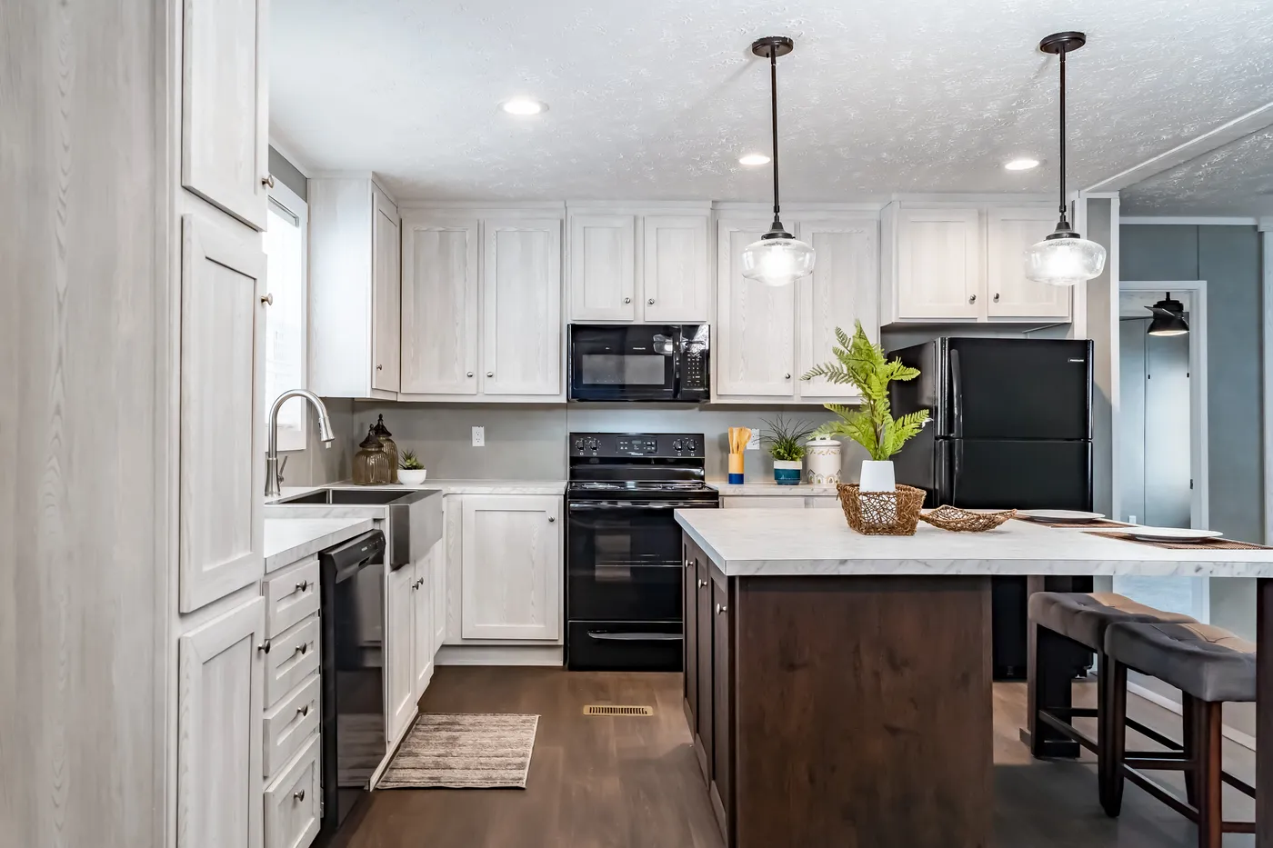 The ULTRA BREEZE 52 Kitchen. This Manufactured Mobile Home features 3 bedrooms and 2 baths.