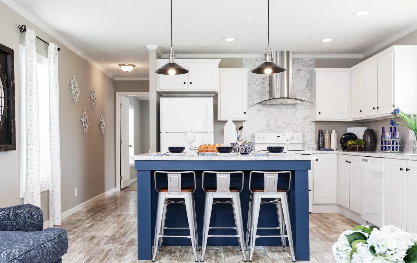 The 777 "COOL BREEZE" 7616 Kitchen. This Manufactured Mobile Home features 3 bedrooms and 2 baths.