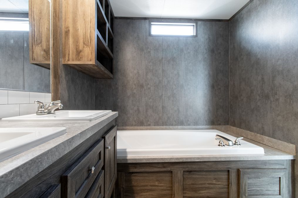 The ANNIVERSARY 16763I Master Bathroom. This Manufactured Mobile Home features 3 bedrooms and 2 baths.